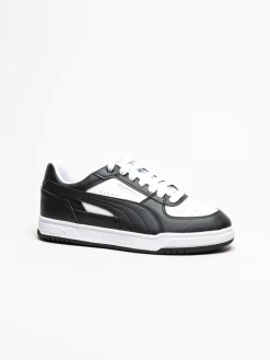 Puma - Caven III - Svartvita sneakers i skinnimitation