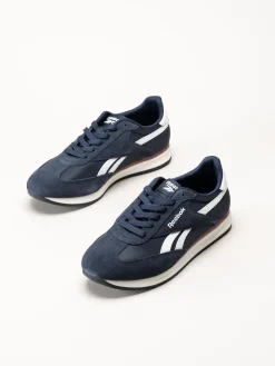 Reebok - World 70 - Mörkblå sneakers i mocka och textil