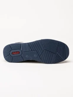 Rieker - Mörkblå slip on skor i stickad mesh