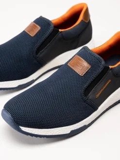 Rieker - Mörkblå slip on skor i stickad mesh