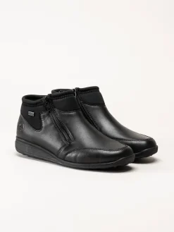 Rieker - Svarta boots i skinn och textil