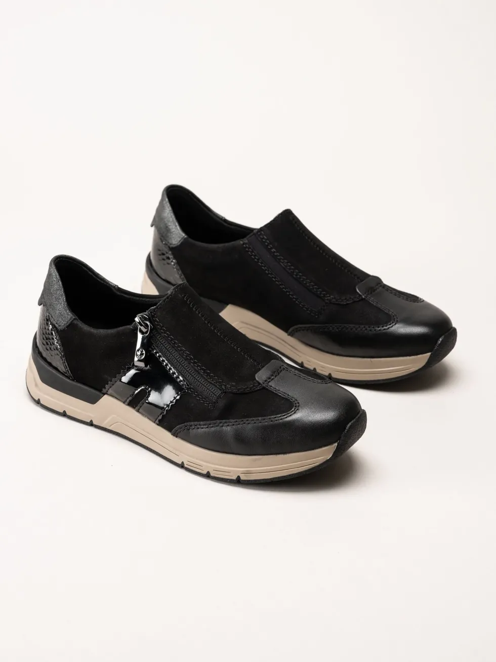 Rieker - Svarta promenadsneakers i nubuck och skinn