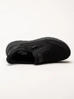 Rieker - Svarta slip on promenadskor i oljad nubuck