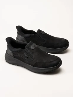 Rieker - Svarta slip on promenadskor i oljad nubuck