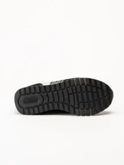 Rieker - Svarta sneakers i mocka och textil