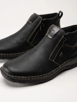 Rieker - Svarta ullfodrade boots i skinn