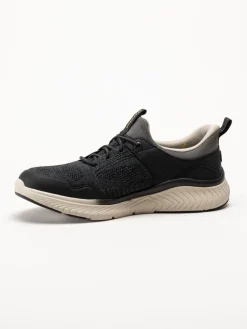 Skechers - Relaxed fit - Svarta slip-ins sneakers i mesh