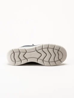 Tamaris Wide - Mörkblå sneakers i skinnimitation