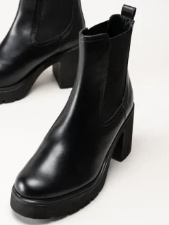 Unisa - KLINO_F25_STT - Svarta högklackade boots i skinn